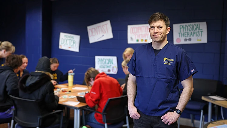 A senior in health sciences, Spencer Holsinger draws on 16 years of U.S. Army experience to run hands-on clinical skills clinics for fellow 